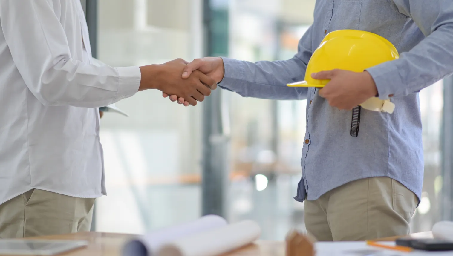 Handshake between home builder and client